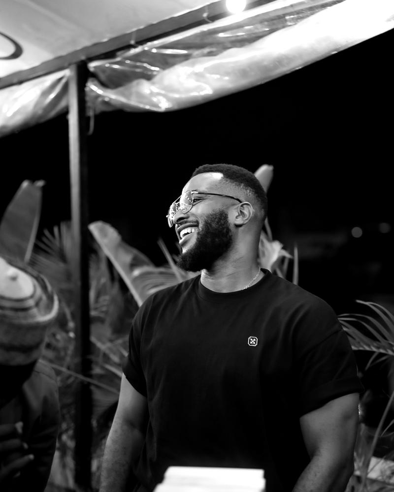 A member laughing on the rooftop