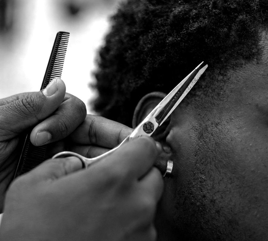 A member getting a haircut, one of the weekly picks