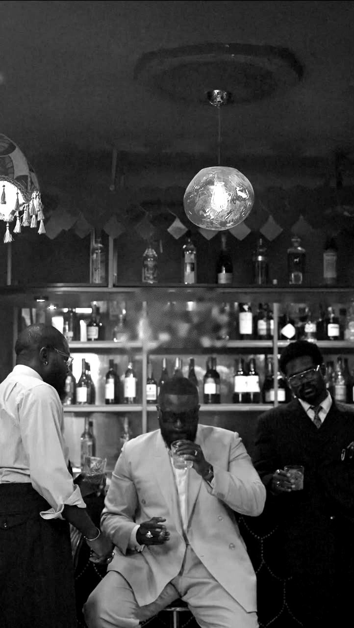 Club Black members with drinks at the lounge bar